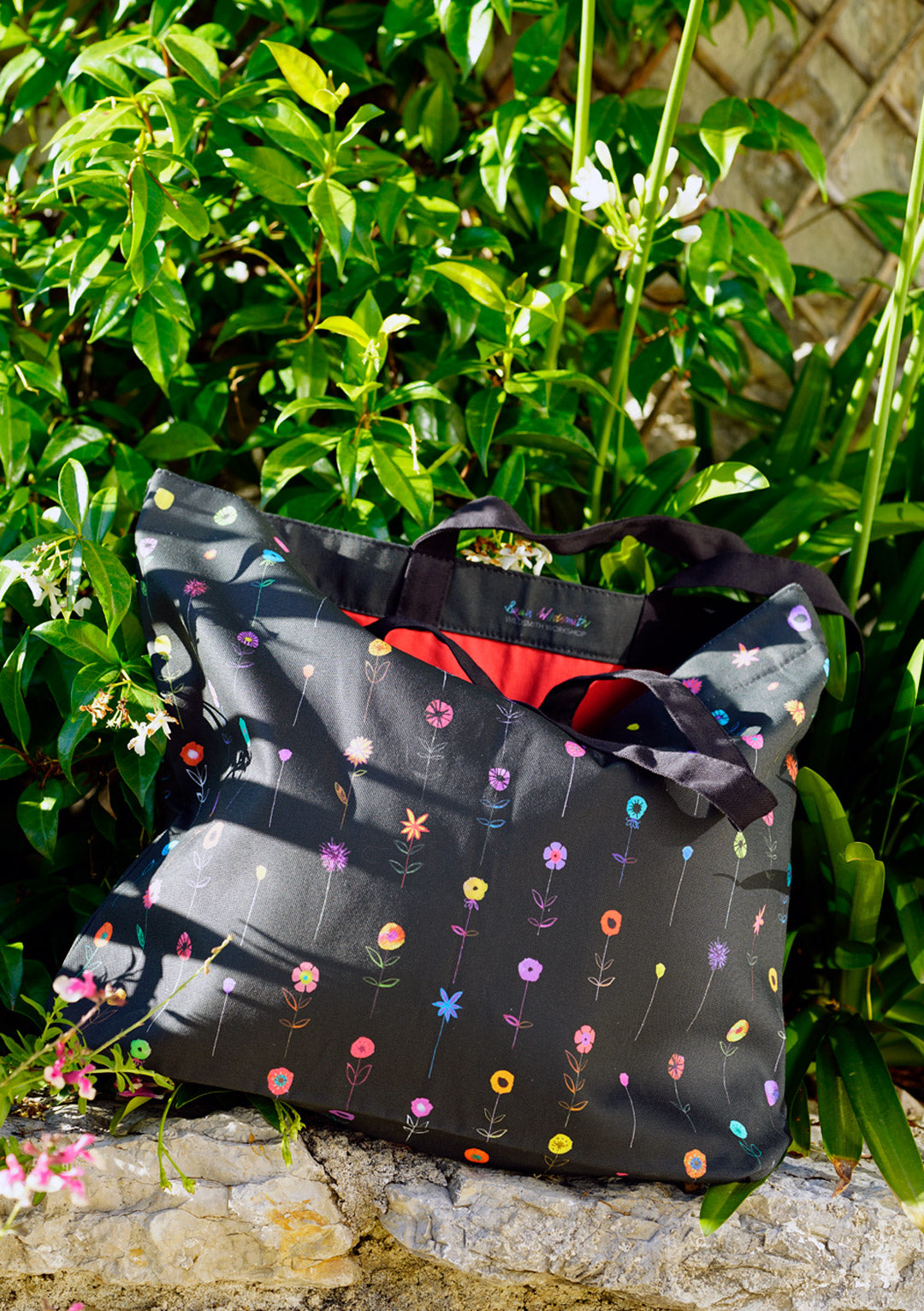 A child's garden of flowers, large tote on black - only 6 left !