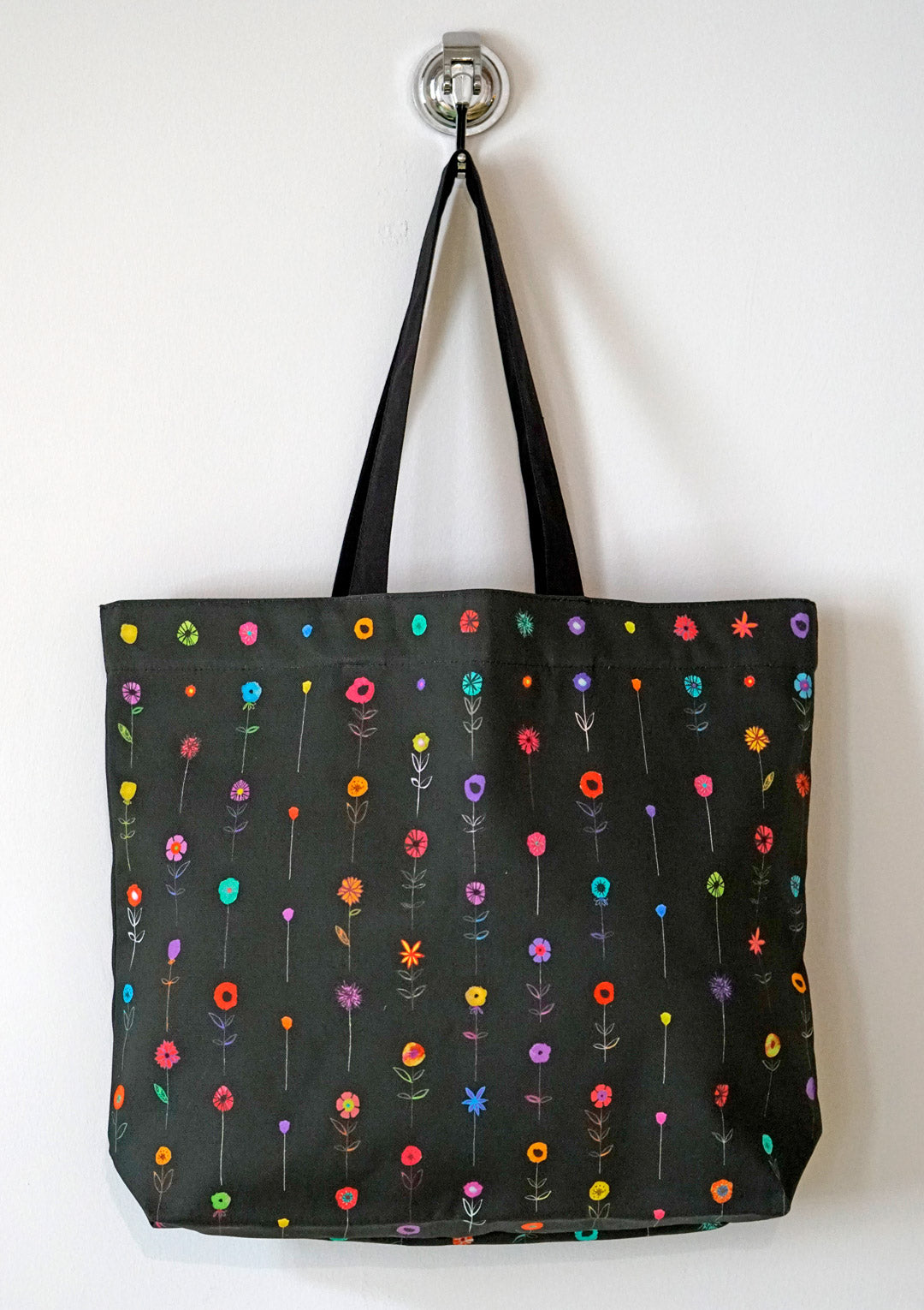 A child's garden of flowers, large tote on black - only 6 left !